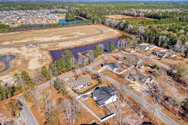 drone / aerial view with a water view