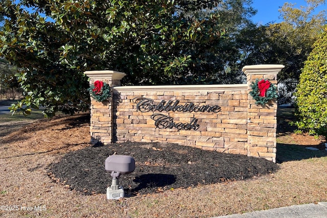 view of community sign