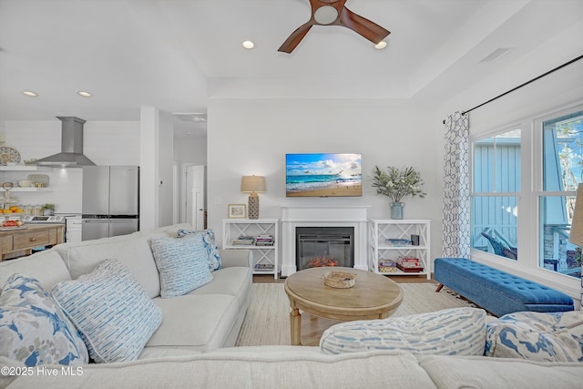 living room with ceiling fan