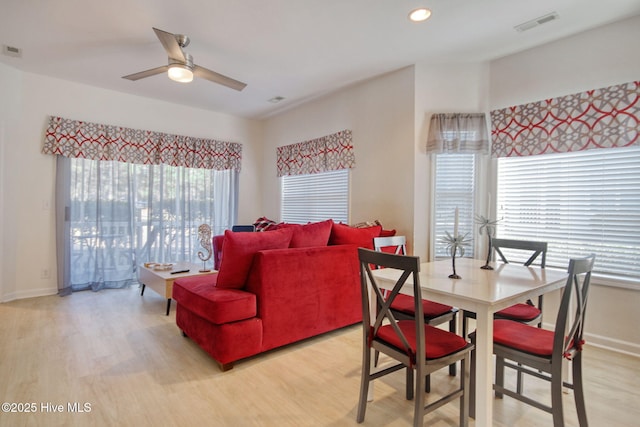 dining area featuring ceiling fan and light hardwood / wood-style flooring