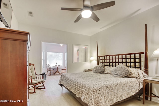 bedroom featuring light hardwood / wood-style flooring and ceiling fan