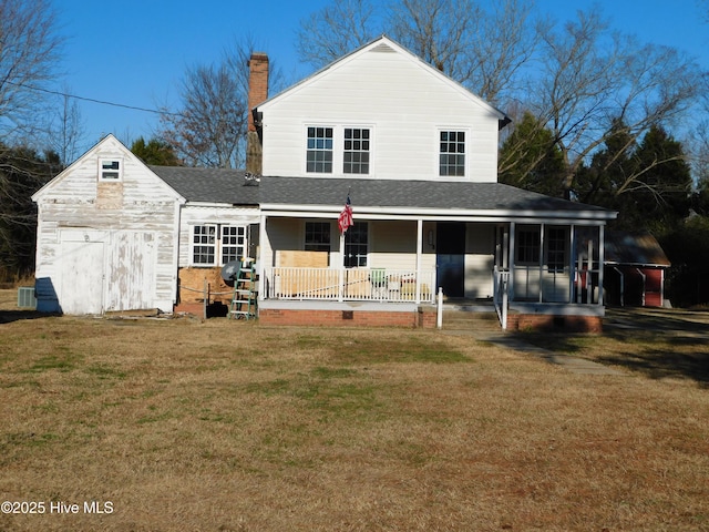 view of front of house featuring a front lawn and a porch