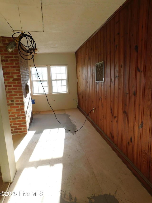 empty room with wooden walls