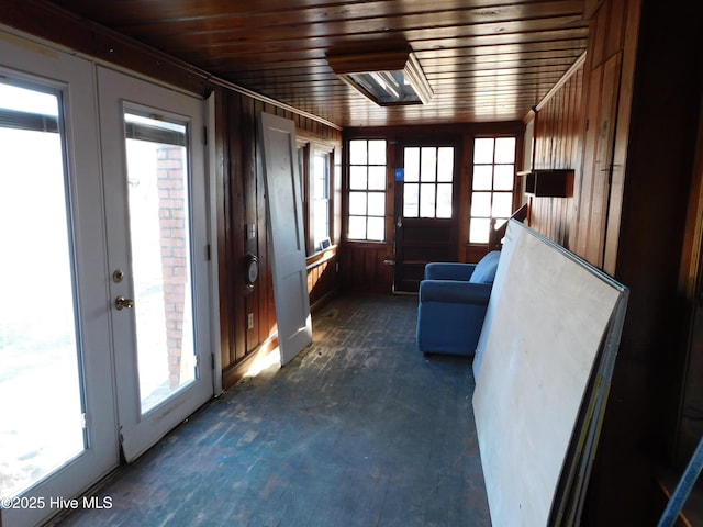 sunroom with french doors and wooden ceiling