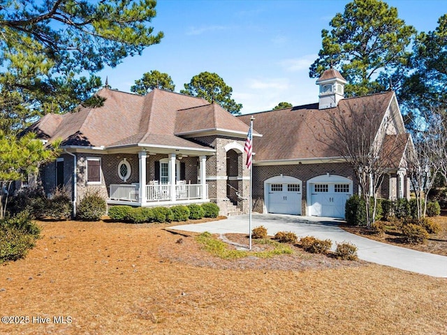 view of front of house with a garage and covered porch