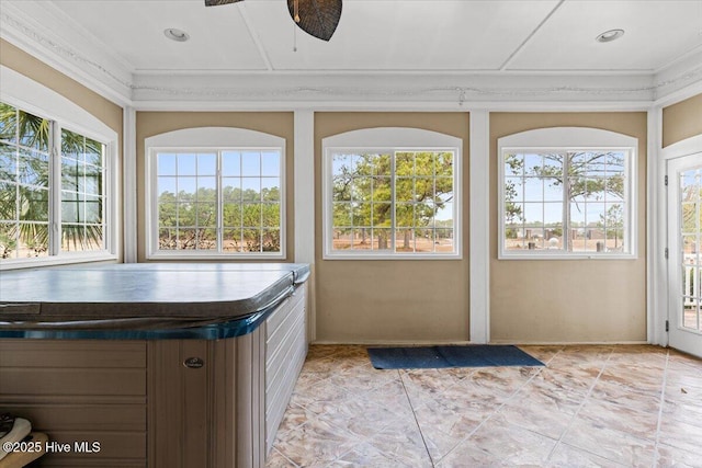 unfurnished sunroom featuring plenty of natural light