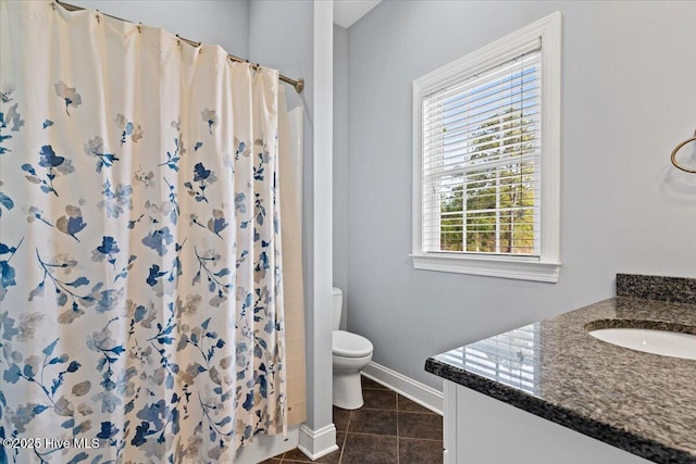 bathroom featuring vanity, tile patterned flooring, toilet, and a shower with shower curtain