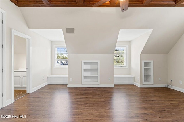 additional living space with lofted ceiling, plenty of natural light, and built in features