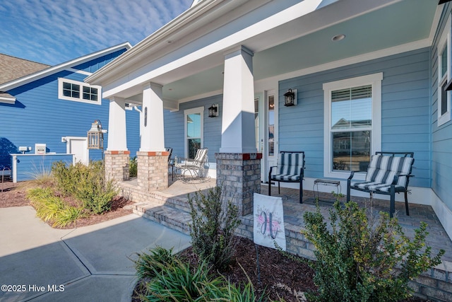 doorway to property featuring a porch