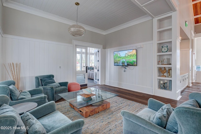 living room featuring crown molding, wooden ceiling, built in features, and dark wood-type flooring