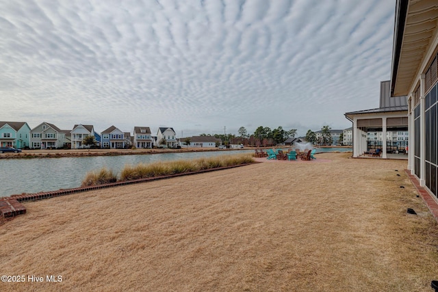 view of yard with a water view