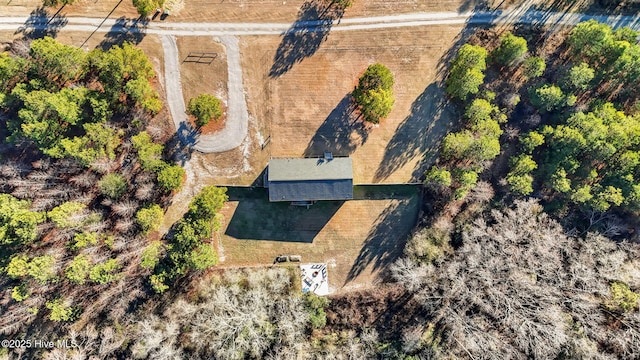 birds eye view of property featuring a rural view