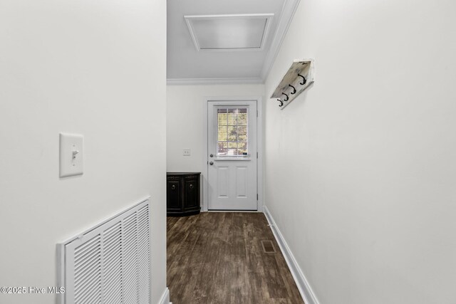 doorway with dark hardwood / wood-style floors and crown molding