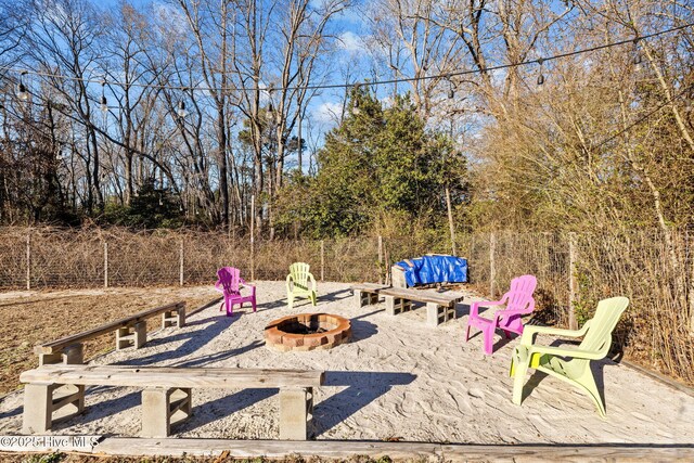 view of yard featuring a fire pit