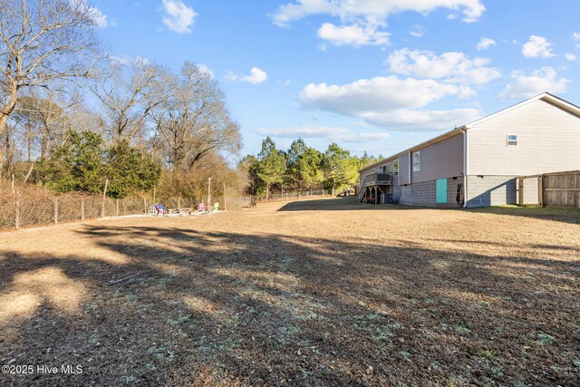 view of yard with a deck