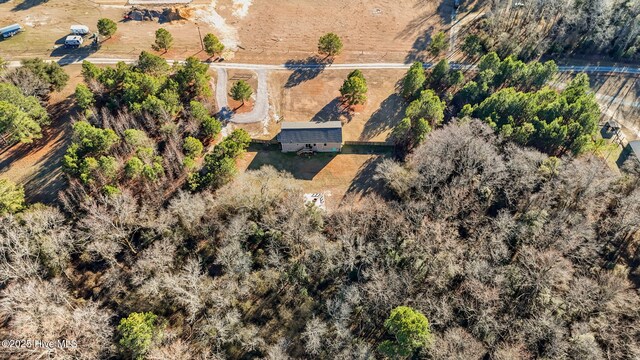 birds eye view of property featuring a rural view