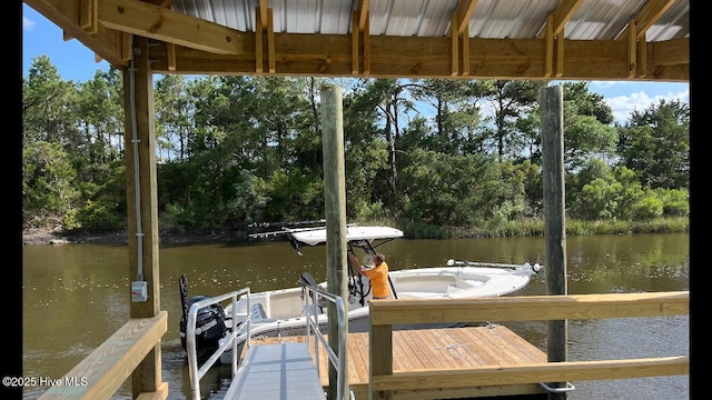 118 SE 9th St, Oak Island, NC 28465 - dock featuring a water view and view of wooded area