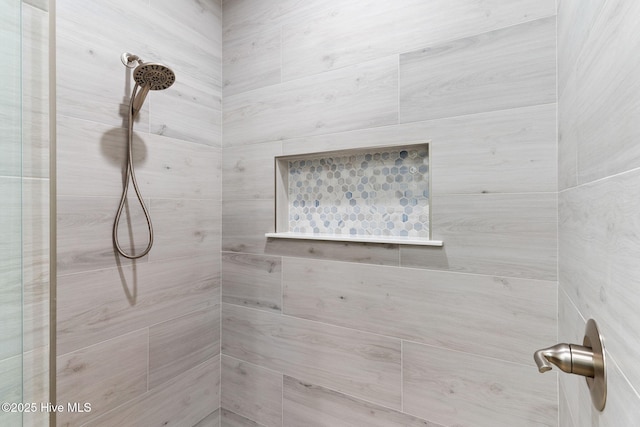 118 SE 9th St, Oak Island, NC 28465 - bathroom featuring tiled shower