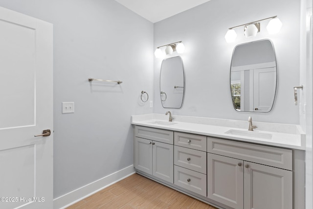 118 SE 9th St, Oak Island, NC 28465 - full bath with double vanity and wood finished floors
