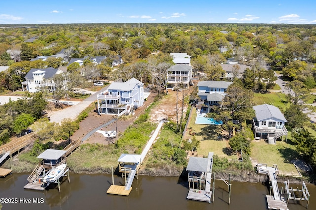 118 SE 9th St, Oak Island, NC 28465 - aerial perspective of suburban area featuring a large body of water