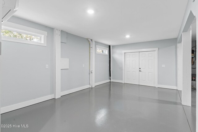 118 SE 9th St, Oak Island, NC 28465 - basement featuring recessed lighting, baseboards, and a wealth of natural light