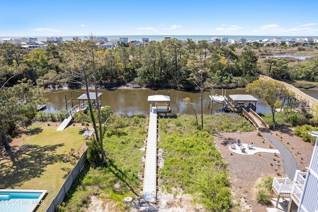 118 SE 9th St, Oak Island, NC 28465 - aerial view of a nearby body of water and a tree filled landscape