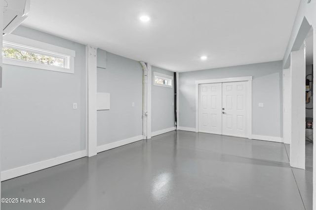 below grade area with recessed lighting and baseboards