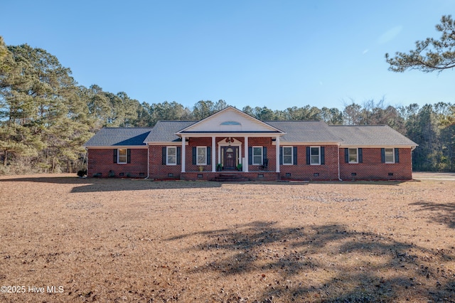 ranch-style house featuring a porch