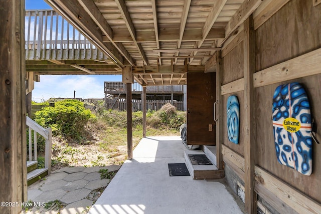 view of patio featuring fence