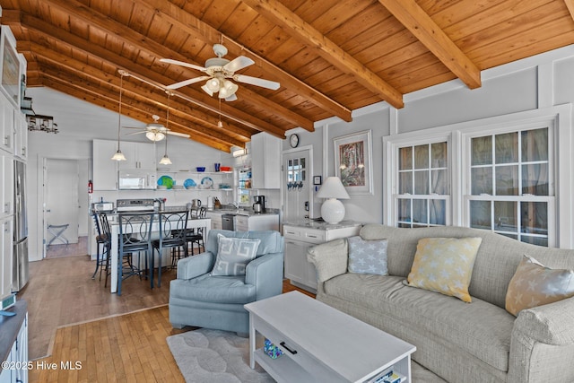 living room featuring wood ceiling, vaulted ceiling with beams, ceiling fan, and light wood-type flooring