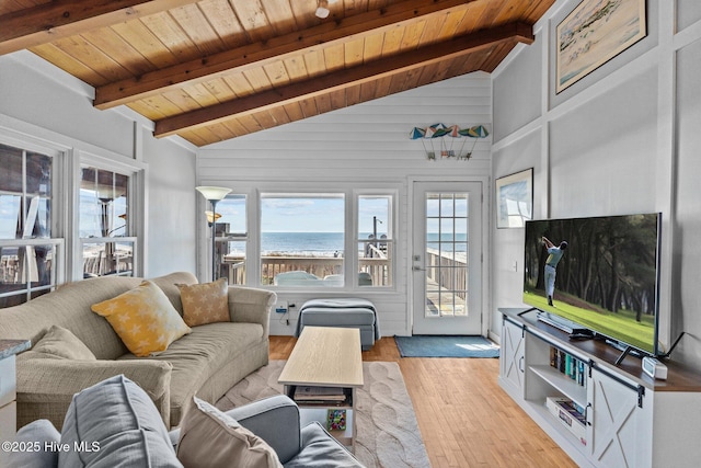 living room featuring beamed ceiling, wooden ceiling, high vaulted ceiling, and light wood-type flooring