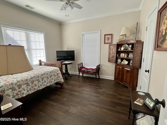 bedroom featuring ceiling fan, dark hardwood / wood-style flooring, and crown molding