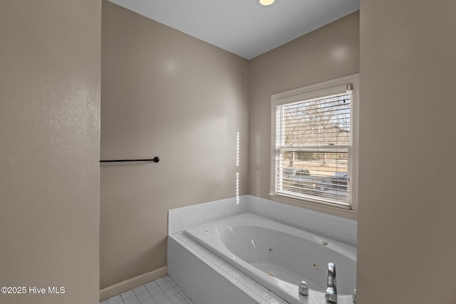 1985 Den Tree Ct, New Bern, NC 28562 - bathroom featuring baseboards, a jetted tub, and tile patterned flooring