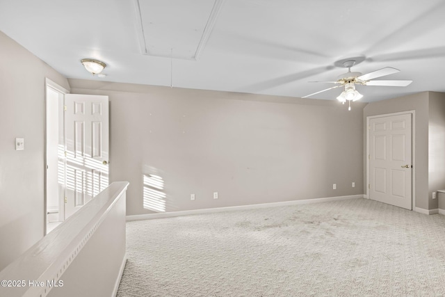 1985 Den Tree Ct, New Bern, NC 28562 - unfurnished room with carpet flooring, a ceiling fan, baseboards, and attic access