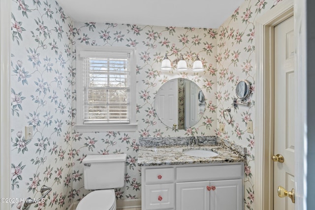 1985 Den Tree Ct, New Bern, NC 28562 - half bath featuring wallpapered walls, toilet, and vanity