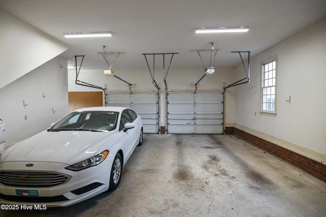 1985 Den Tree Ct, New Bern, NC 28562 - garage featuring a garage door opener