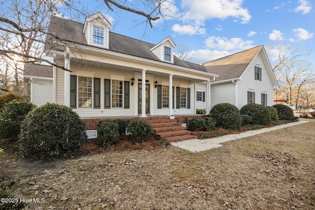1985 Den Tree Ct, New Bern, NC 28562 - cape cod home with a porch and roof with shingles