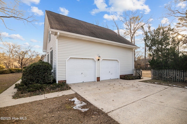 1985 Den Tree Ct, New Bern, NC 28562 - garage with fence and concrete driveway