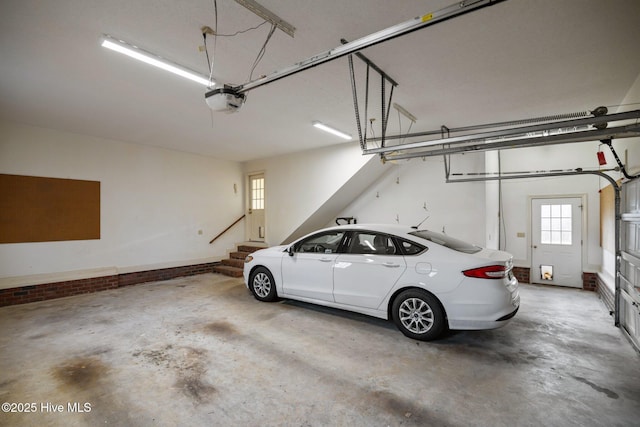 garage featuring a garage door opener