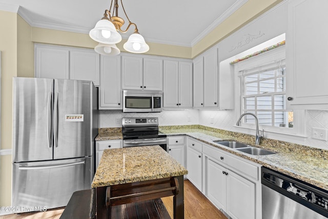 1985 Den Tree Ct, New Bern, NC 28562 - kitchen featuring white cabinetry, a sink, stainless steel appliances, and crown molding
