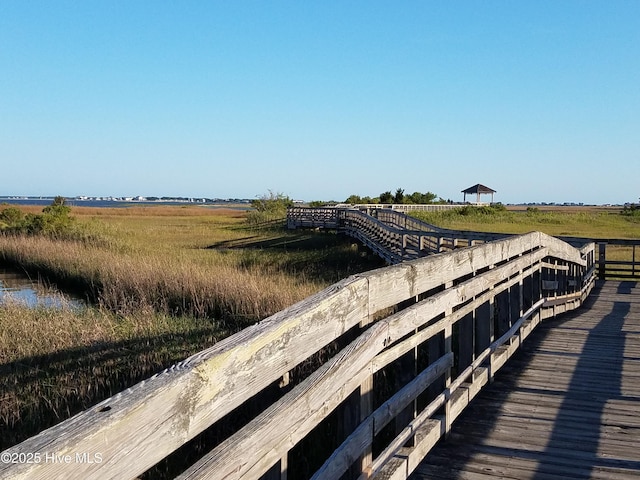 view of dock featuring a rural view