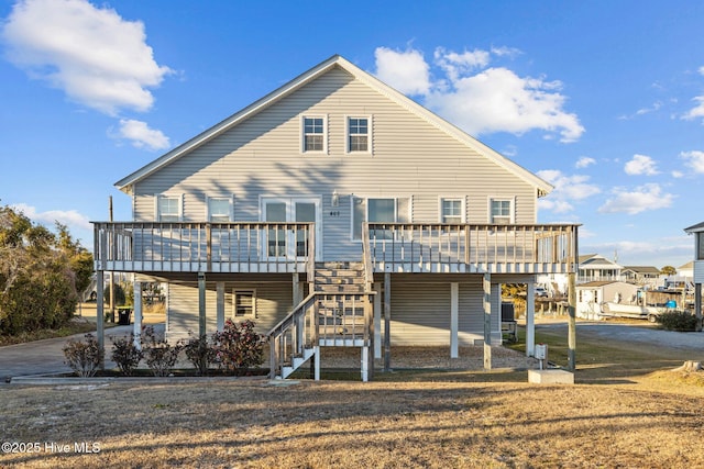 rear view of property with a deck