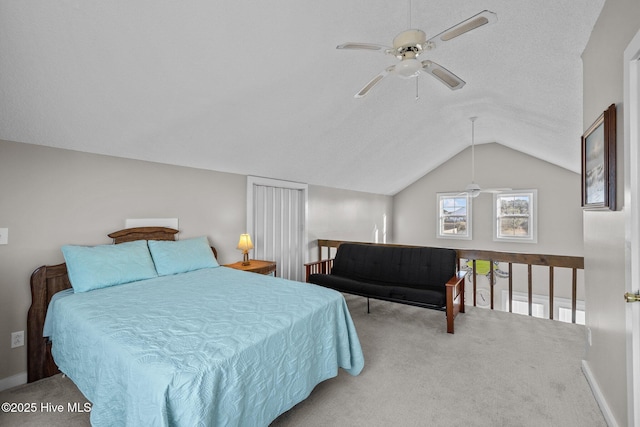 carpeted bedroom featuring ceiling fan and lofted ceiling