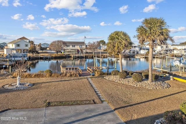 view of dock with a water view