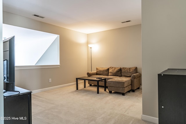 living room with light colored carpet