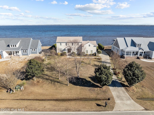 birds eye view of property featuring a water view