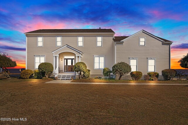 colonial house with a water view