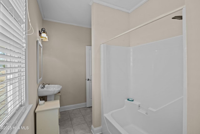 bathroom featuring sink, ornamental molding, tile patterned floors, and shower / tub combination