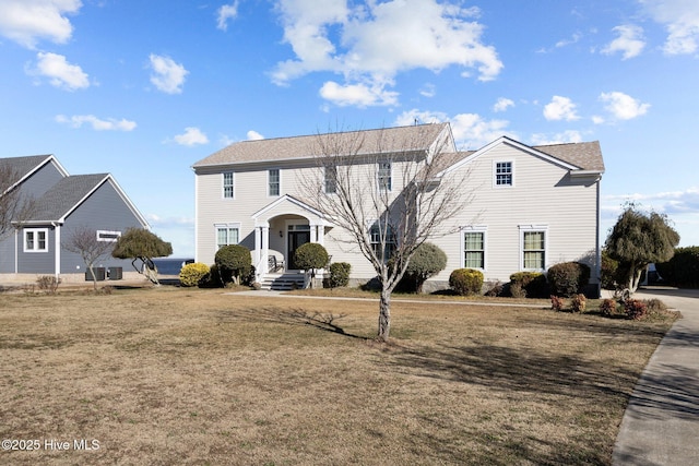 view of front of house with a front lawn