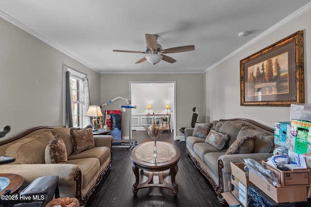 living room featuring ceiling fan, crown molding, and dark wood-type flooring